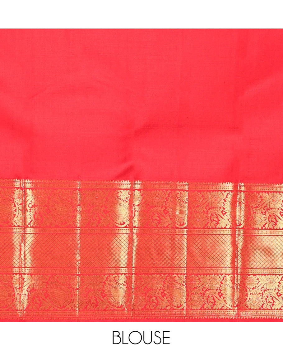 Red Kanchipuram Silk Saree, Spotlighted with Zari Buttas, Highlighted by Zari Border of Rekku, Rudraksham, Paisley Vine and Jaal Designs, Jaal Pallu, and a Matching Blouse
