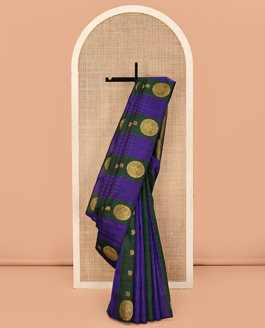 Blue and Green Striped Kanchipuram Silk Saree, Beautifully Bedecked with Muthu Stripes, Mayil, and Round Iruthaipakshi Motifs All Over Its Body, Grand Pallu of Triangle Motifs, and Paired with a Contrast Blouse