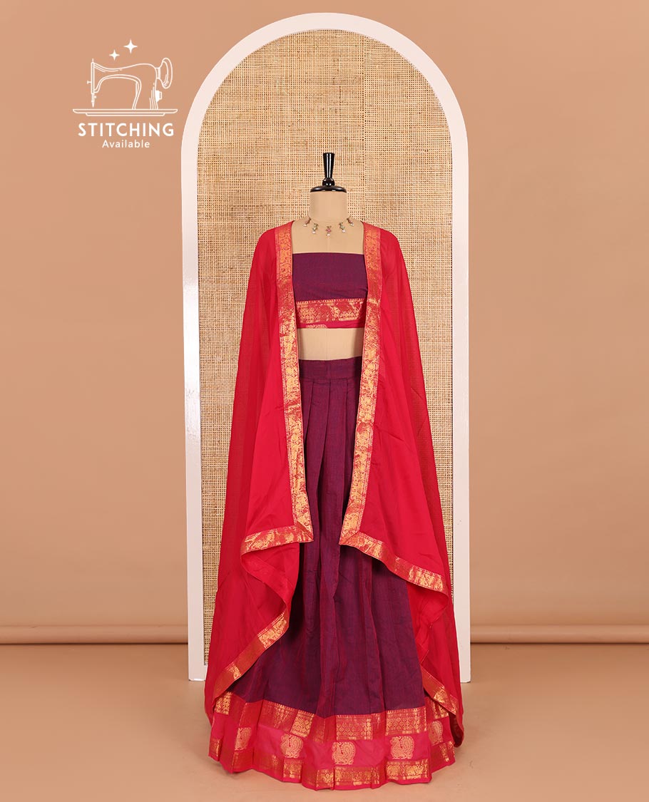 Majenta-rani pink sungudi cotton half-saree, plain with contrast traditional zari peacock motif bordered skirt, matching blouse, and a zari bordered dhavani