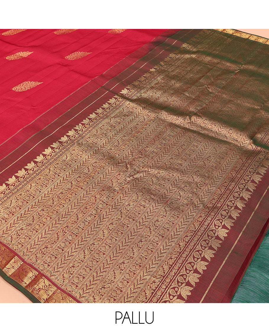 Red Kanchipuram Silk Saree, Woven with Zari Buttas All Over Its Body, Complemented by a Contrast Border of Mayil Designs, Intricately Designed Pallu, and Paired with a Contrast Blouse