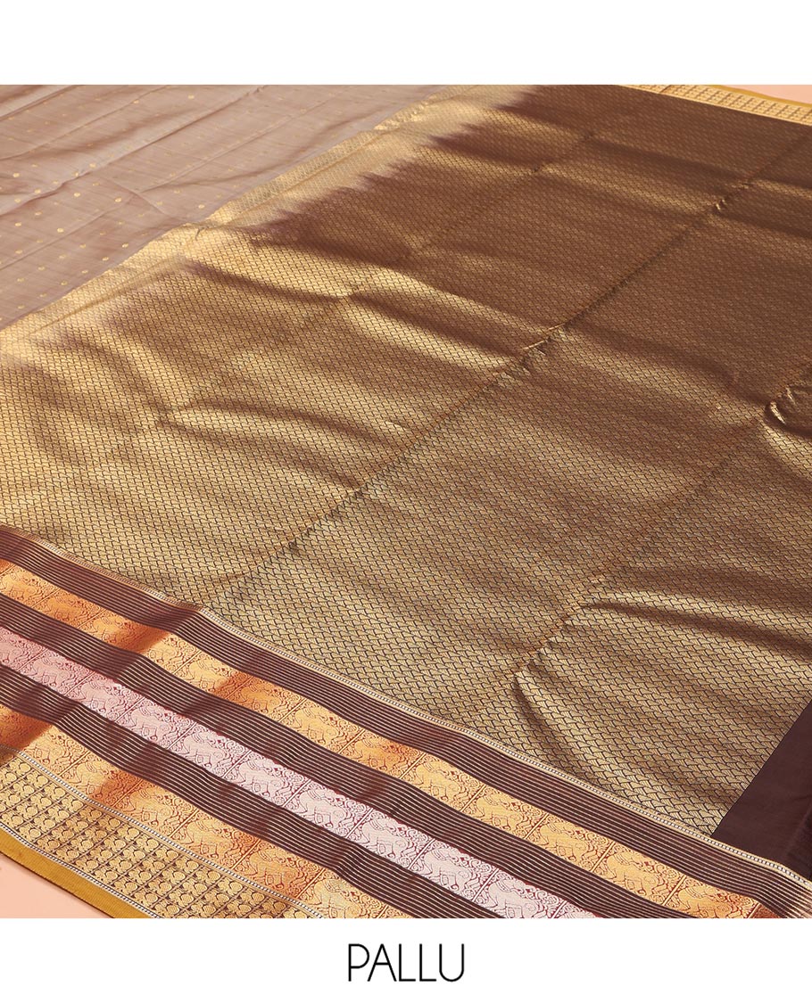 Grey Vasundhara Lite Silk Mix Saree, Elegantly Decked up with Zari Buttas on Its Body, Complemented by a Contrast Border of Muthu, Stripes, Yaali, and Mayil Designs, Intricately Designed Pallu, and Paired with a Contrast Blouse