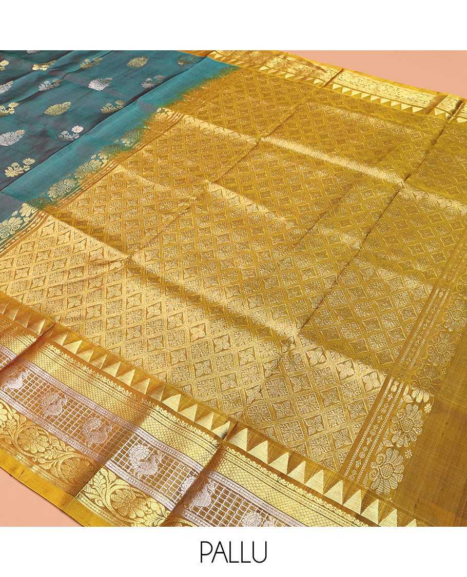 Green Venkatagiri Silk Saree, Detailed with Zari Buttas All Over Its Body, Complemented by a Contrast Traditional Zari Design Border, Grand Jaal Pallu, and Paired with a Contrast Blouse