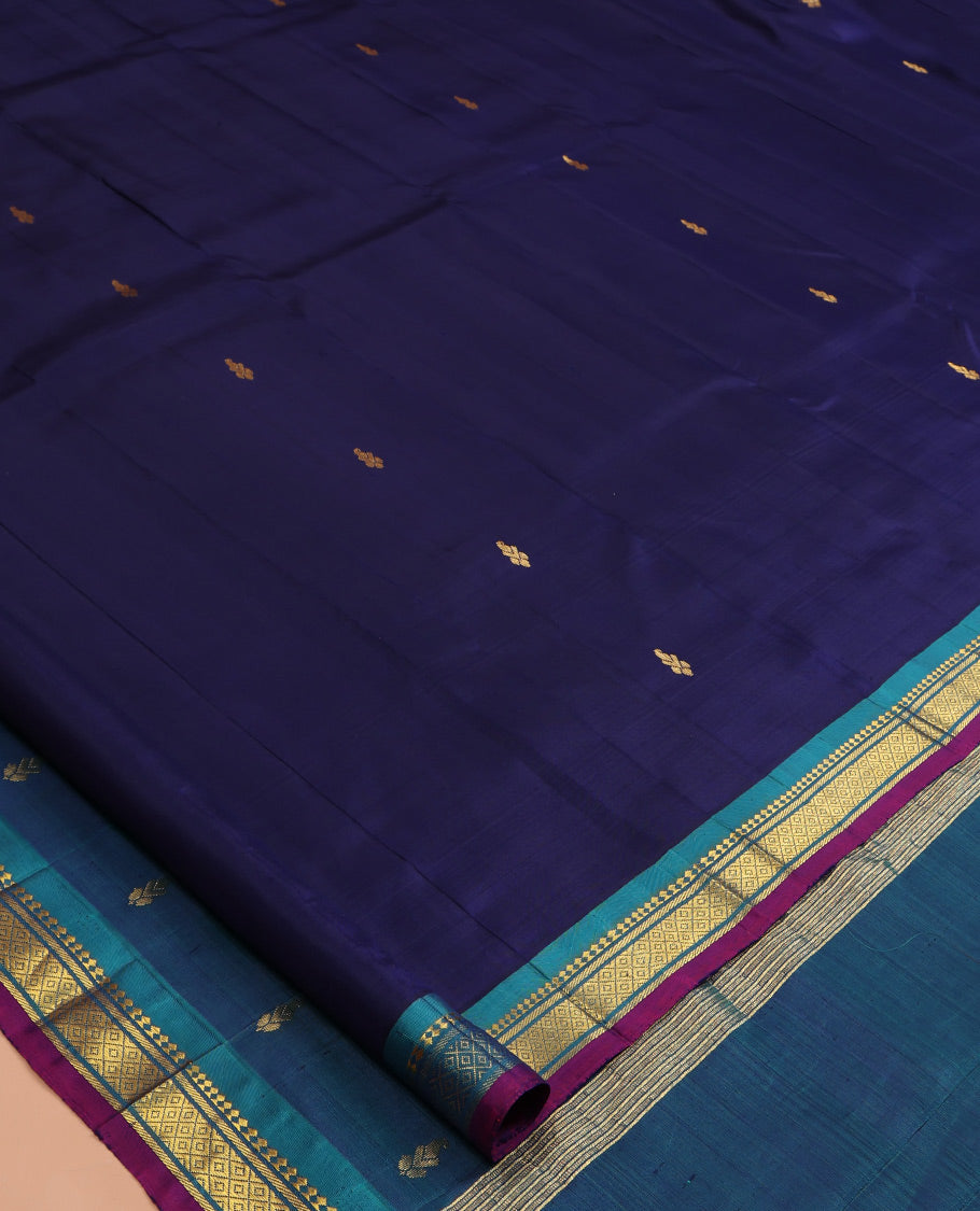 Blue Kanchipuram Silk Saree, Mesmerised with Zari Buttas, a Contrast One-sided Border of Panner Sombu, Banaras, and Mayil Kann Designs, Zari Woven Pallu, and No Blouse