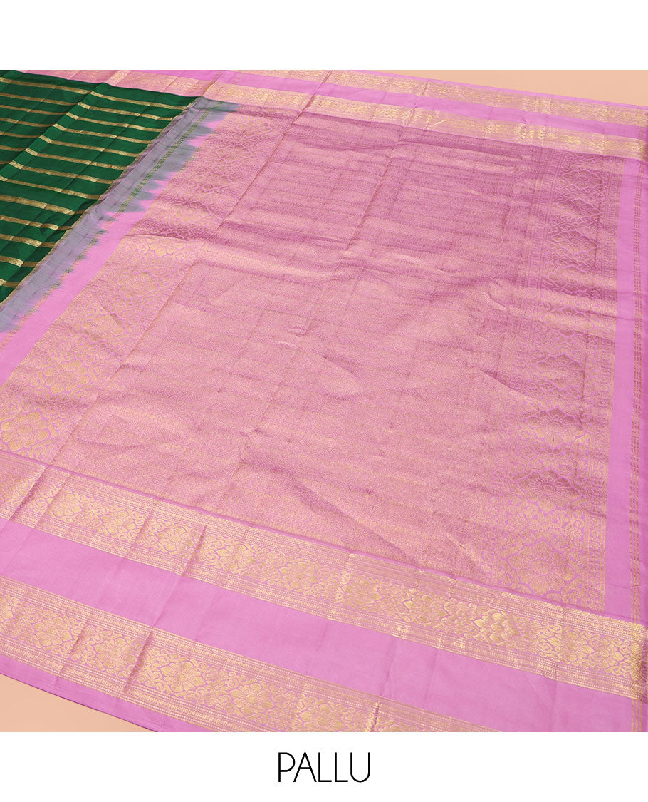 Green Vasundhara Silk Saree, Gracefully Embellished with Zari Stripes All Over Its Body, Complemented by Contrast Rettai Pettu Traditional Zari Design Border, Intricately Designed Pallu, and Paired with a Contrast Blouse