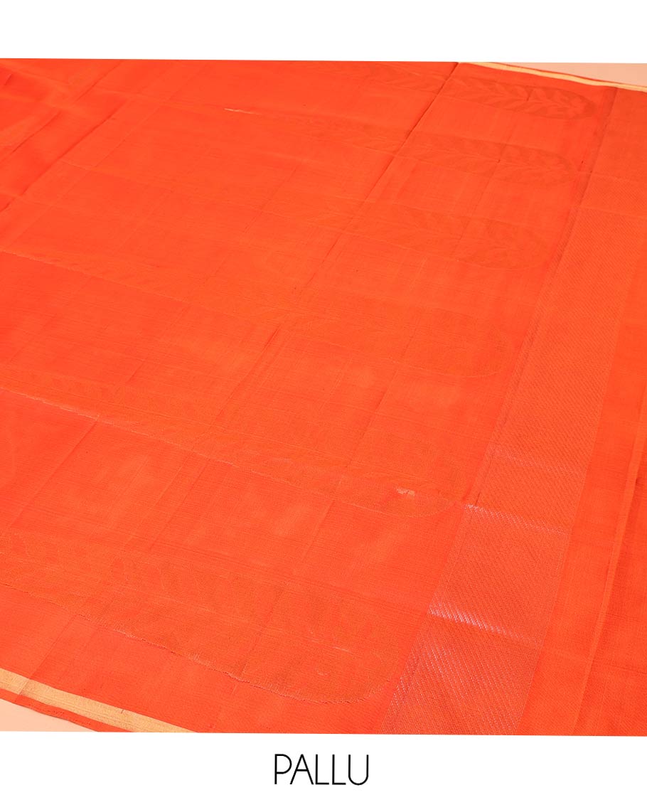 Orange Mayuri Soft Silk Saree, Adorned with Pine-Tree Buttas All Over Its Body, Subtle Zari Piping Border, Sparsely Woven Pallu, and Paired with a Matching Blouse