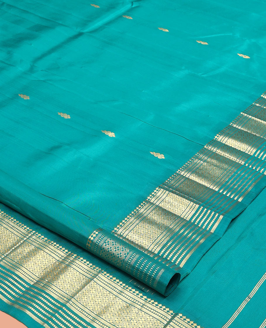 Blue Kanchipuram Silk Saree, Woven with Zari Buttas, a One-Sided Border of Panner Sombu, Banaras, Muthu, and Jaal Designs, a Zari Design Pallu, and No Blouse