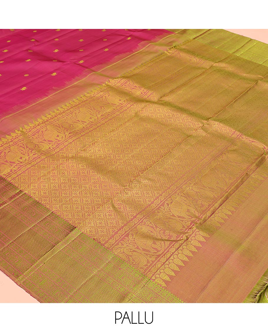 Red Kanchipuram Designer Silk Saree, Subtly Sparkled With Buttas All Over Its Body, Complemented by Contrast Border of Rekku, Rudraksham, Then Kuli Kann, Laddu Kamalam, and Mayil Kann Designs, Jaal Pallu and Paired with a Contrast Blouse