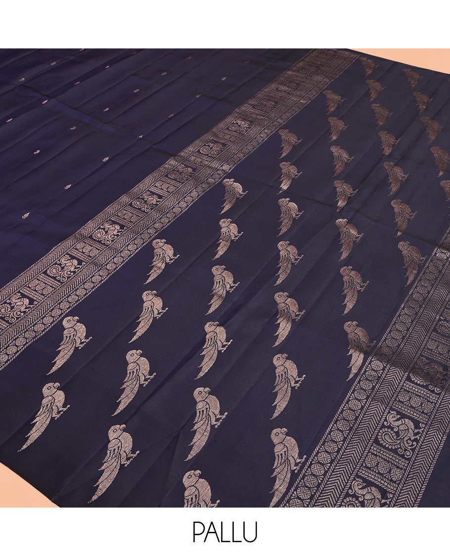 Blue Mayuri Soft Silk Saree, Finely Crafted with Buttas All Over Its Body, Highlighted by Self-Border of Parrot, Chakram, and Mayil Designs, Pallu Steeped with Parrot Designs, and Paired with a Matching Blouse