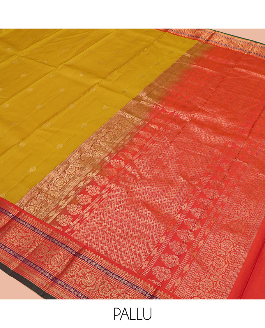 Yellow Vasundhara Silk Saree, Featuring Zari Buttas All Over Its Body, Complemented by a Contrast Border of Thilakam, Manga, Kamalam, Kathir, and Kodi Visiry Designs, Grand Jaal Pallu, and Paired with a Contrast Blouse