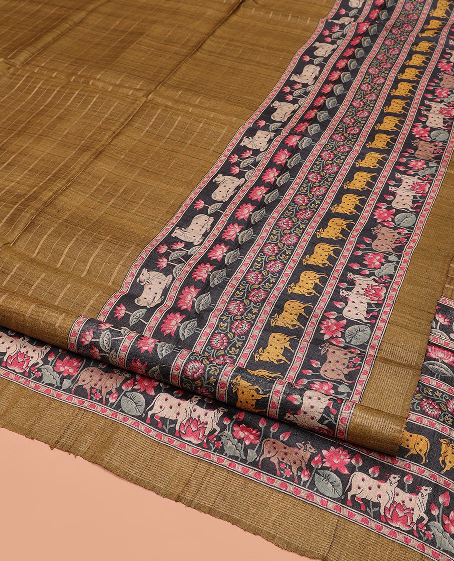 Mustard Tussar Silk Saree, Sparsely Threaded with Stripes, Complemented by a Contrast Pichwai Cow-Lotus Print Border, Printed Pallu, and a Contrast Blouse