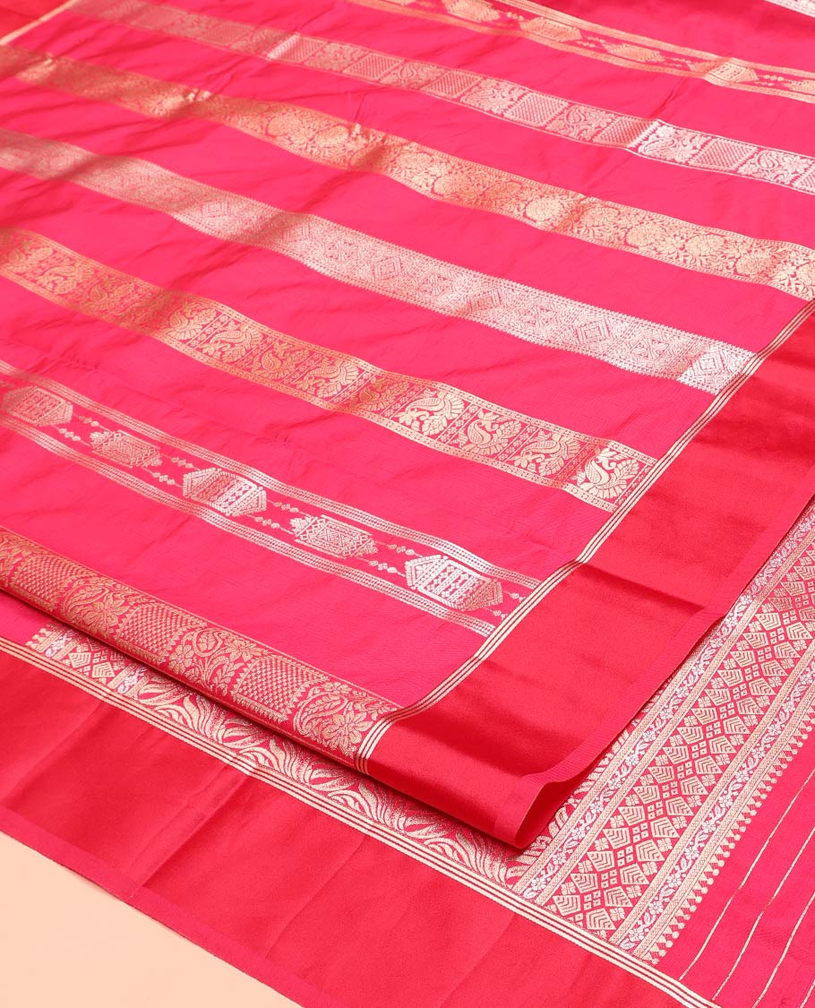 Rani Pink Dupion Silk Saree, Richly Features Vertically Woven Traditional Patterns in Zari, Complemented by Contrast Zari Satin Border, Rich Pallu, and Paired with a Matching Blouse