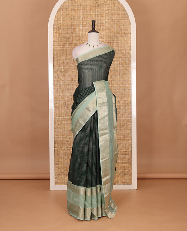 Green Checked saree with contrast zari border and contrast striped pallu along with contrast blouse