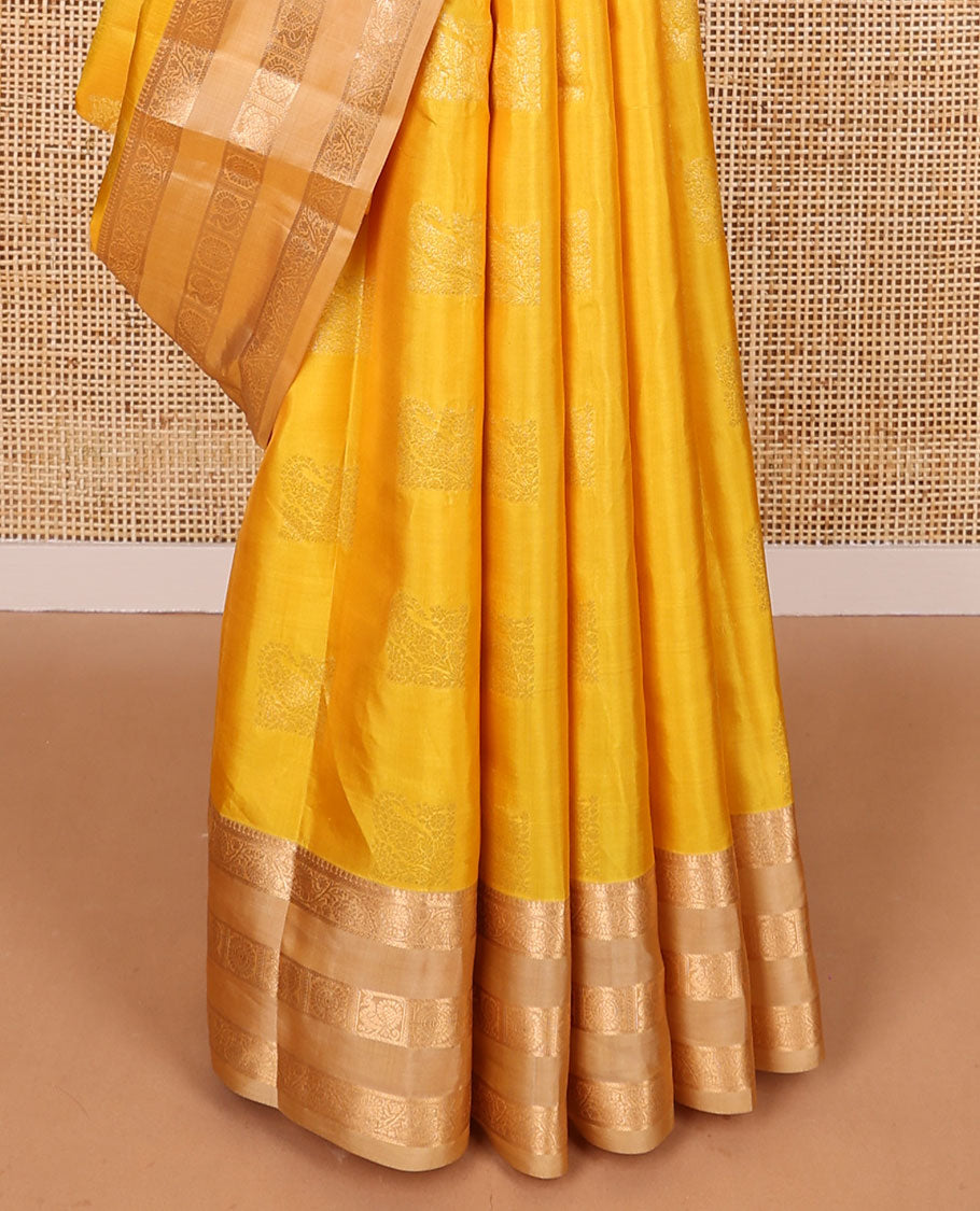 Yellow geometric design vasundhara elite silk saree with contrast rettai pettu zari design border & intricate zari design pallu