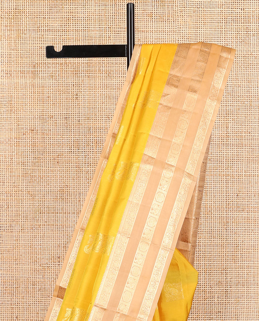 Yellow geometric design vasundhara elite silk saree with contrast rettai pettu zari design border & intricate zari design pallu