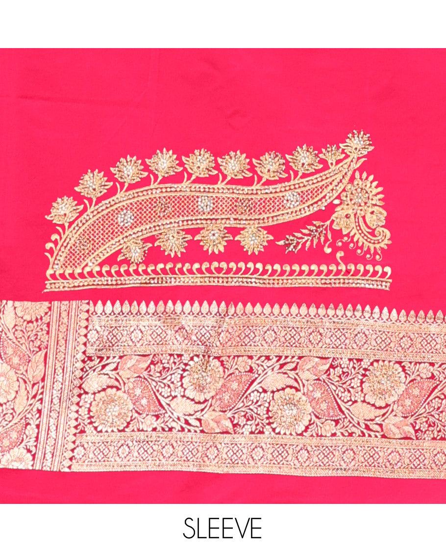 Red Banarasi Satin Saree, Spotlighted with Floral Buttas, a Floral Creeper Border, Intricate Stonework Pallu, and a Matching Blouse