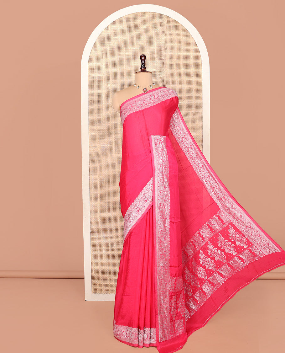 Pink Plain Fancy Crepe Saree, Highlighted by a Floral Border, Intricately Designed Pallu, and a Matching Blouse