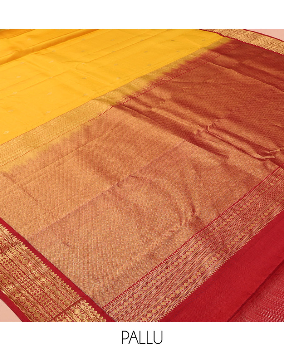 Yellow Vasundhara Lite Silk Mix Saree Features Zari Buttas, a Contrast Border of Thilakam Mokku, Muthu, Banaras, Rudraksham, and Neli Designs, Jaal Pallu, and a Contrast Blouse
