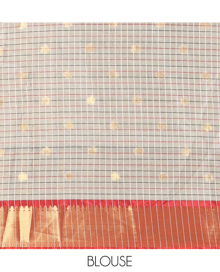 Grey Semi-Soft Silk Saree, Accentuated with Buttas and Checks On Its Body, Complemented by Contrast Traditional Zari Designs Woven Ganga-Jamuna Border, Pallu Steeped with Buttas, and Paired with a Matching Blouse