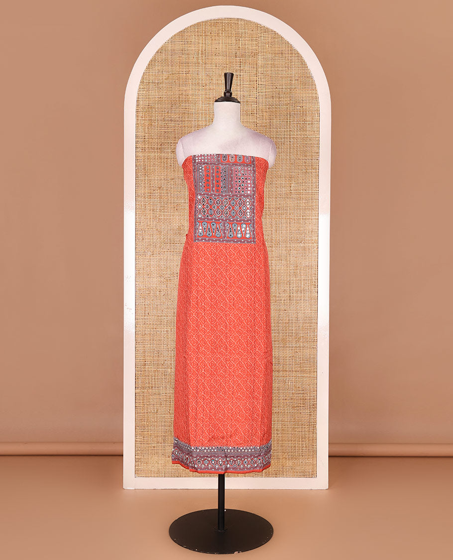 Neon orange material chudidar set, intricately printed with neck mirror work crepe top, Italian crepe bottom, and digital printed mirror work chinon dupatta
