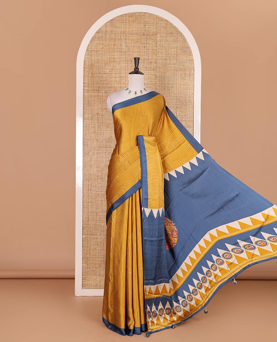Mustard vertical striped gaji silk saree, contrast plain border, ajrakh printed pallu and contrast plain blouse