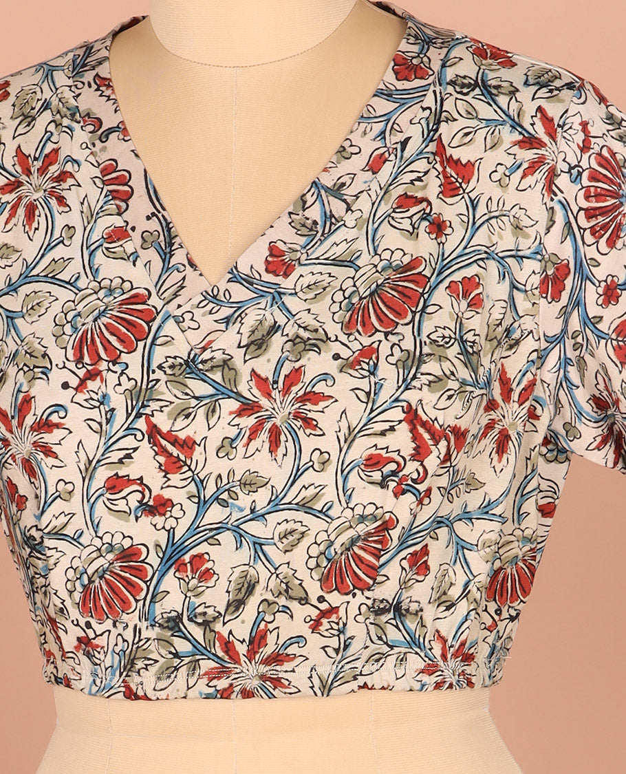 Off-White Readymade Blouse Richly Printed with Floral Motifs, Featuring a Front V-Neck, a Back Closed Neck, and Full Sleeves