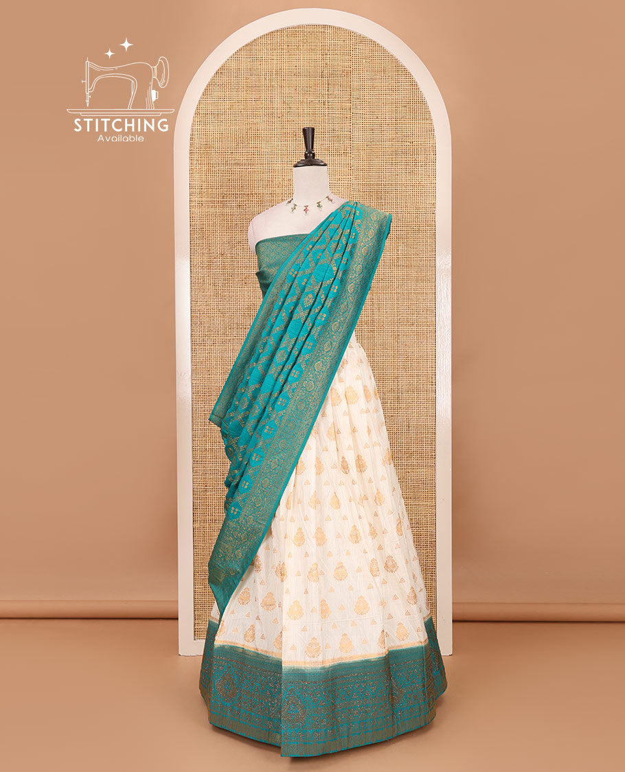 Cream georgette crepe halfsaree,zari buttas & traditional Swarovski stonework rama-green border skirt, jacquard blouse & banarasi jacquard dhavani