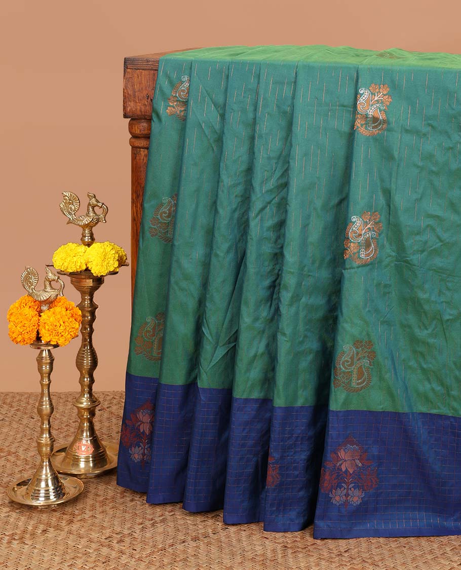 Green zari mango butta design soft silk saree with lotus flower design border & rich weaving pallu along with butta design blouse