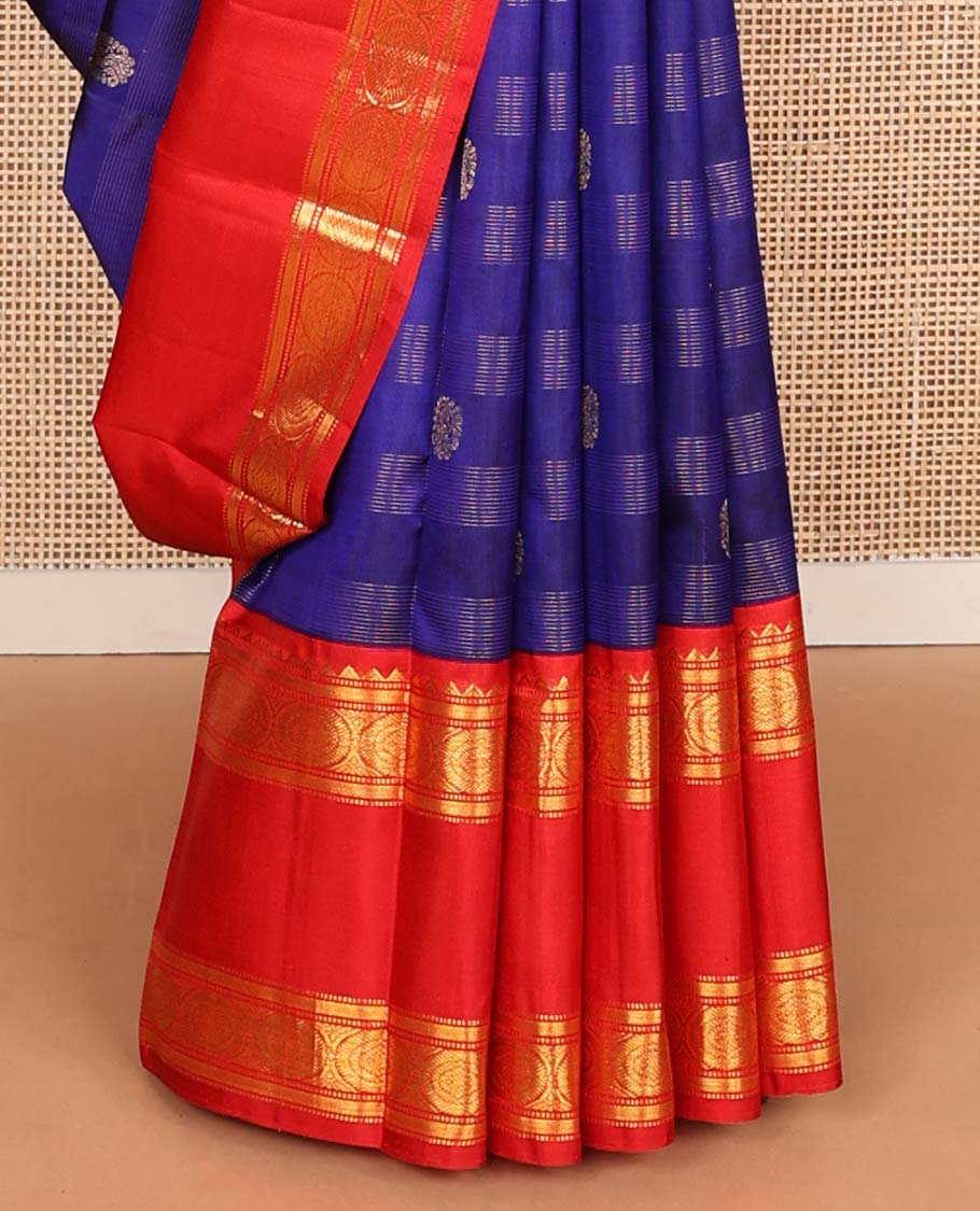 Blue zari stripes, and buttas Kanchipuram korvai silk saree, contrast rettai pettu neer korvai border of thilakam mokku, neli, muthu, kodi visiry, manga, yaanai, and mayil designs, and vanki design pallu