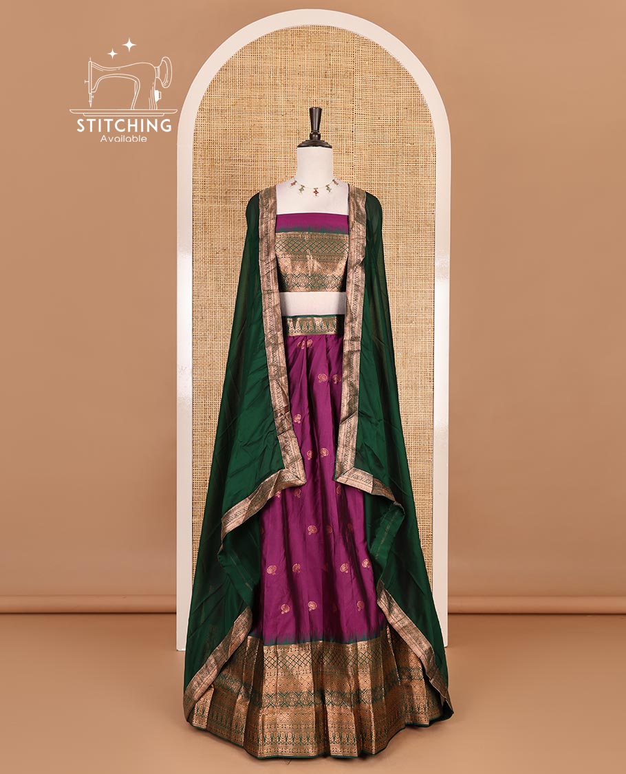 Purple taffeta silk half saree, zari buttas with contrast green traditional zari border, matching zari blouse, and contrast plain zari border dhavani