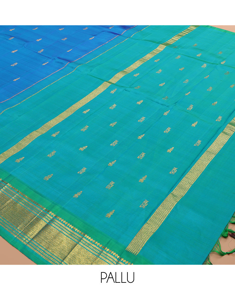Blue Kanchipuram Silk Saree, Woven with Zari Buttas, a Contrast One-Sided Border of Rekku, Banaras, Muthu, and Mayil Kann Designs, Zari Design Pallu, and No Blouse