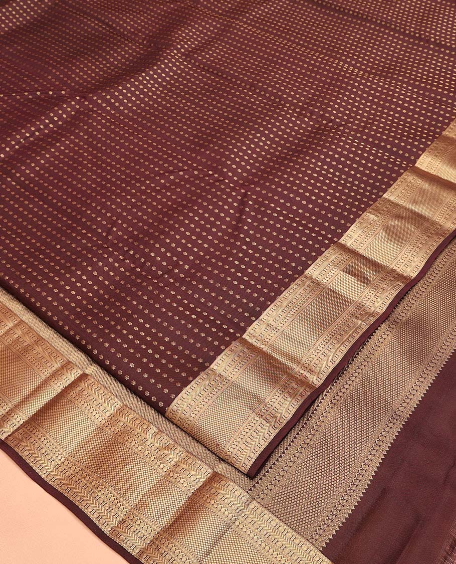 Brown Vasundhara Lite Silk Mix Saree, Masterfully Woven with Zari Buttas All Over Its Body, Highlighted by a Zari Border of Rettai Neli, Poun, Banaras, Manga, and Mayil Kann Designs, Grand Pallu, and Paired with a Matching Blouse