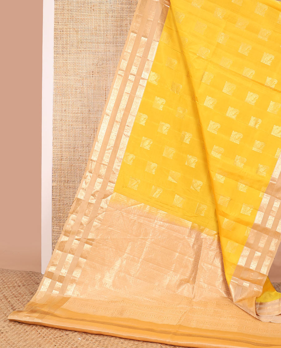 Yellow geometric design vasundhara elite silk saree with contrast rettai pettu zari design border & intricate zari design pallu