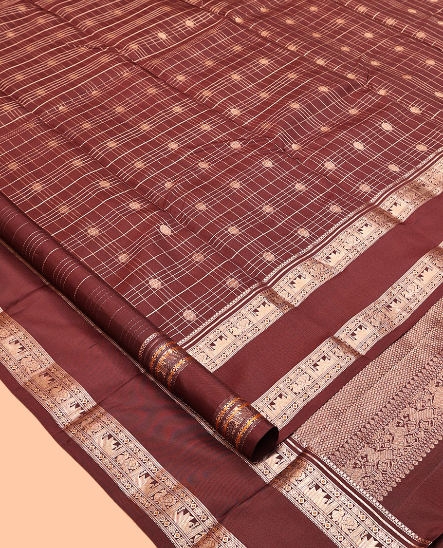 Maroon Kanchipuram Silk Saree, Detailed with Buttas and Checks, a Zari Rettai Pettu Border of Thazampoo Rekku, and Mayil Designs, Grand Pallu, and a Matching Blouse