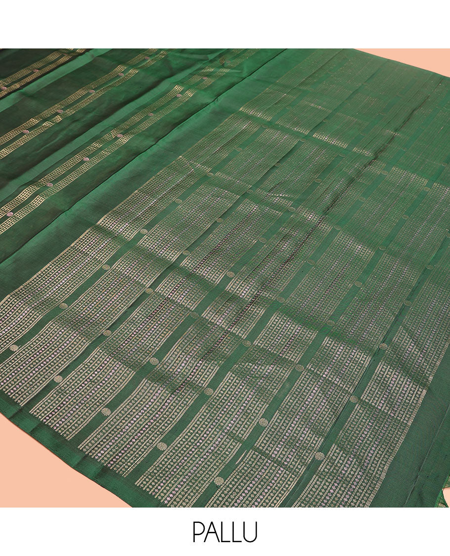 Borderless Green Mayuri Soft Silk Saree, Embellished with Stripes, Diamonds, and Poun Buttas All Over Its Body, Highlighted by a Geometric Design Pallu, and Paired with a Matching Blouse