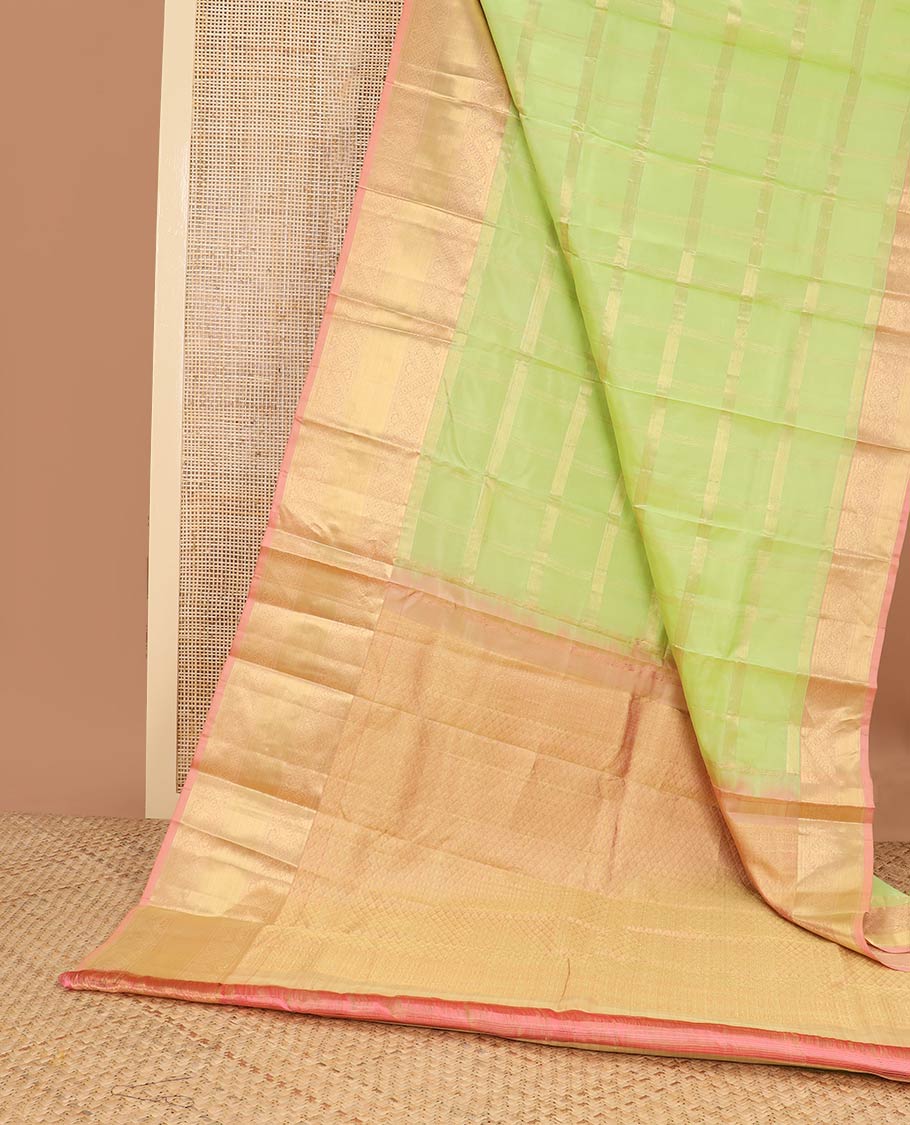 Mint green checked silk saree with contrast intricate zari design border & leaf jaal design pallu