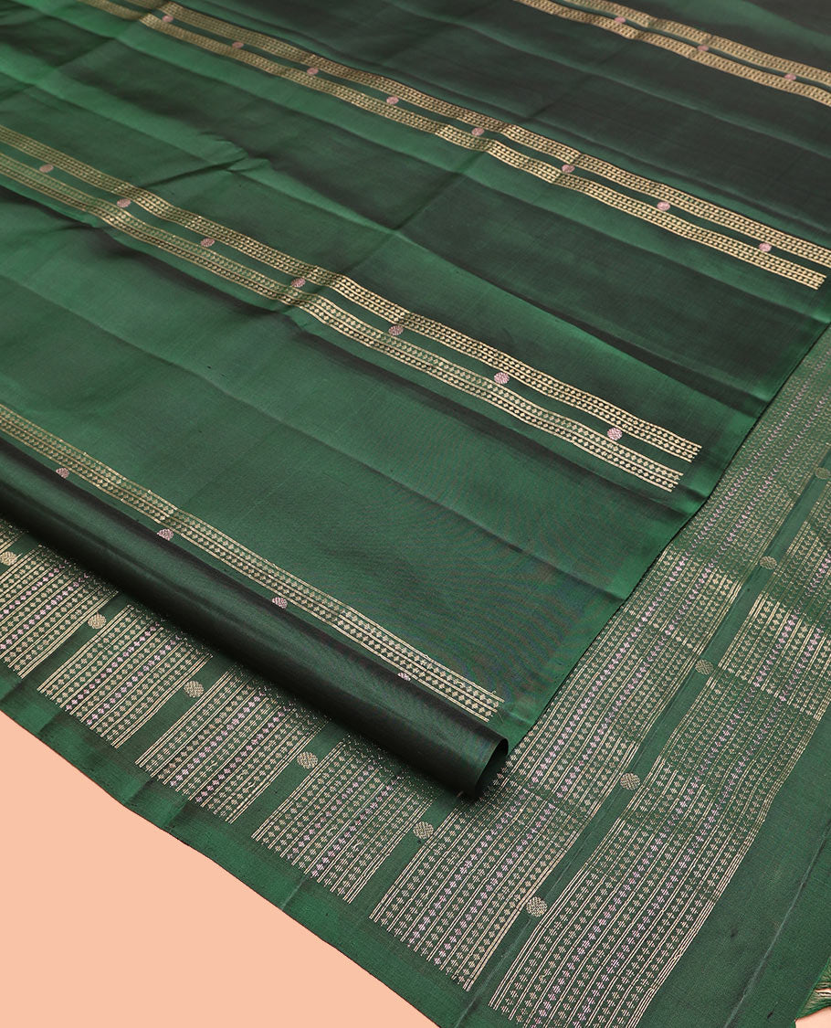 Borderless Green Mayuri Soft Silk Saree, Embellished with Stripes, Diamonds, and Poun Buttas All Over Its Body, Highlighted by a Geometric Design Pallu, and Paired with a Matching Blouse