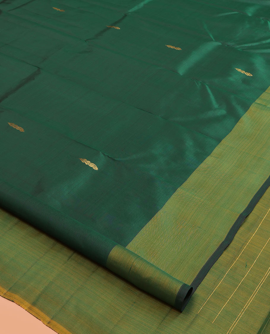 Green Kanchipuram Silk Saree, Highlighted by Zari Buttas, a Contrast Thazampoo Rekku Border, Zari Design Pallu, and a Contrast Blouse
