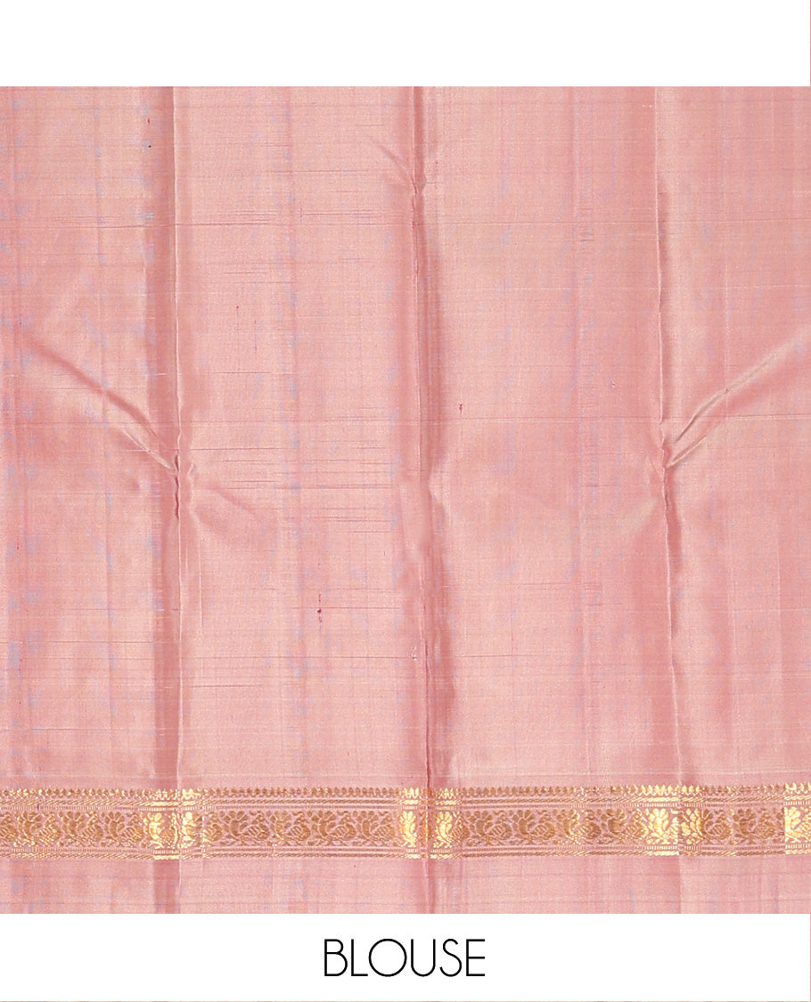 Maroon checked Kanchipuram silk saree, contrast kaal eragina border of thilakam mokku, muthu, and mayil designs, and zari striped pallu