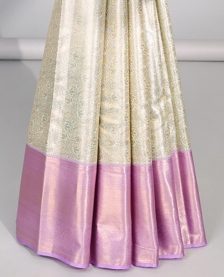 Light green floral jacquard budget silk saree with contrast intricate zari design & floral checked zari design pallu