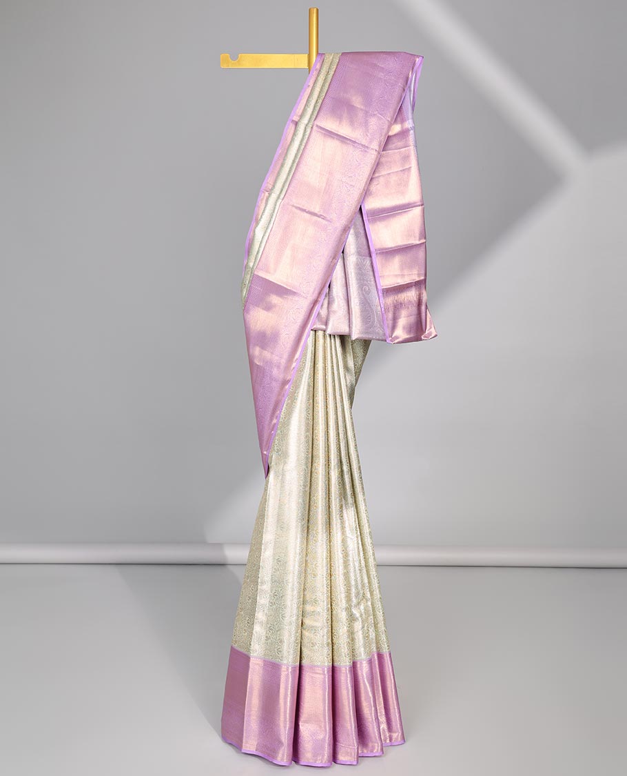 Light green floral jacquard budget silk saree with contrast intricate zari design & floral checked zari design pallu