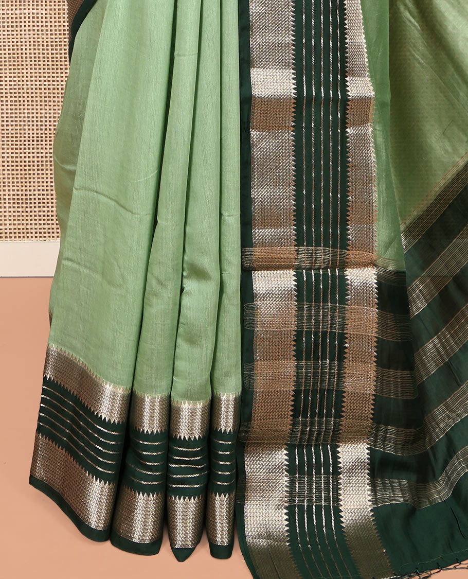 Pista Green Plain Assam Silk Saree, Complemented by a Contrast Traditional Zari Border, Zari-Striped Pallu, and a Contrast Blouse