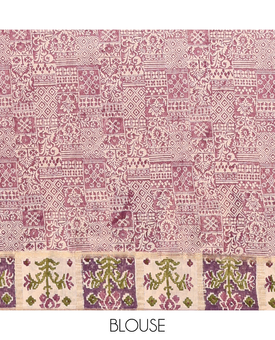 Lavender floral motifs hand block printed Muga silk saree, contrast Patola floral block printed border, and pallu of mango and stripes block print