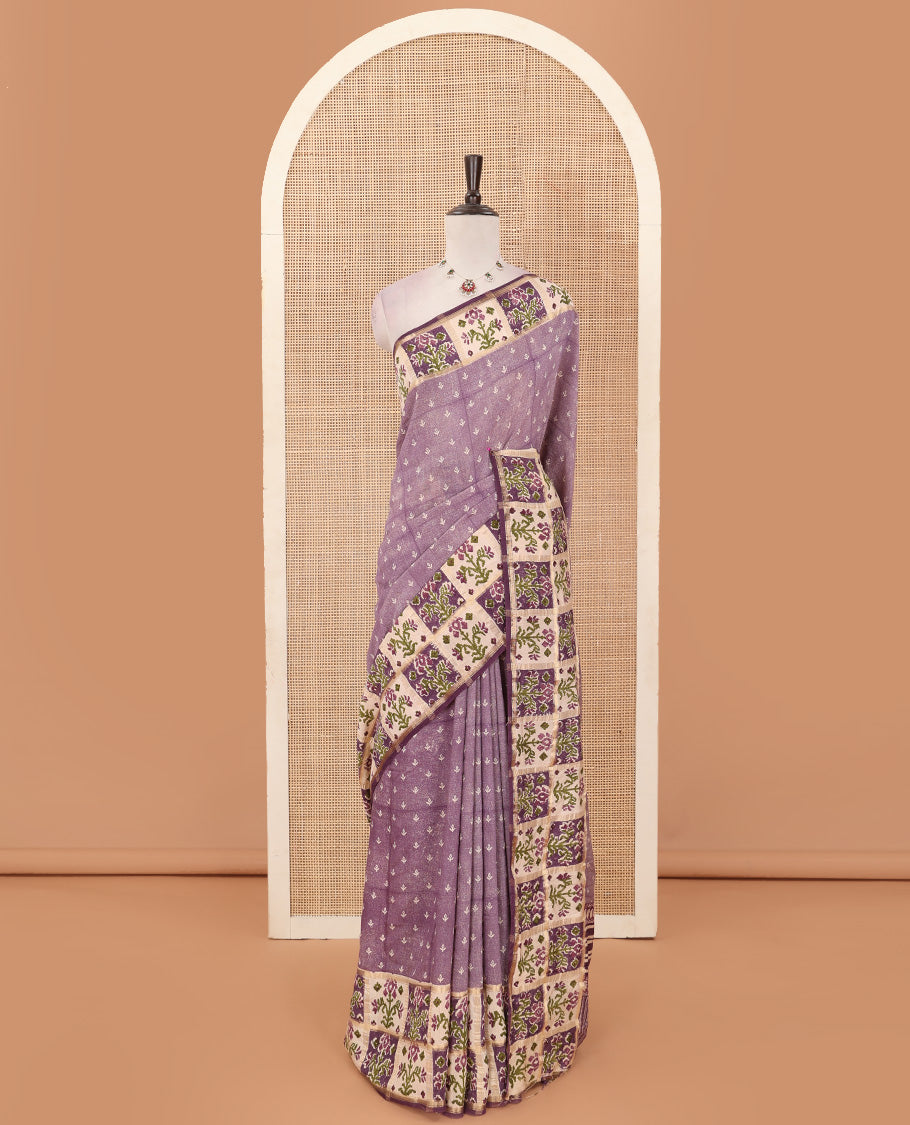 Lavender floral motifs hand block printed Muga silk saree, contrast Patola floral block printed border, and pallu of mango and stripes block print