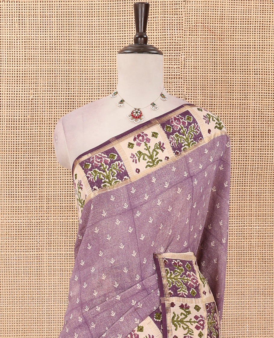 Lavender floral motifs hand block printed Muga silk saree, contrast Patola floral block printed border, and pallu of mango and stripes block print