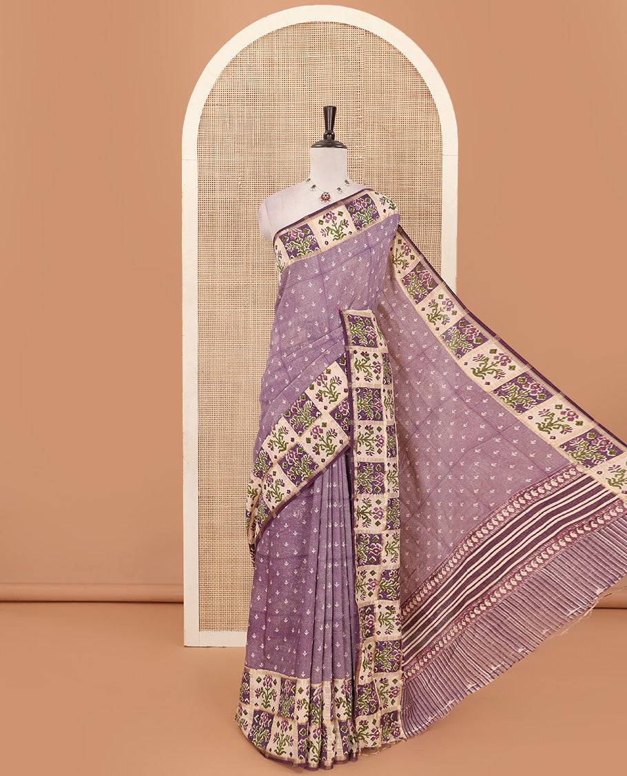 Lavender floral motifs hand block printed Muga silk saree, contrast Patola floral block printed border, and pallu of mango and stripes block print