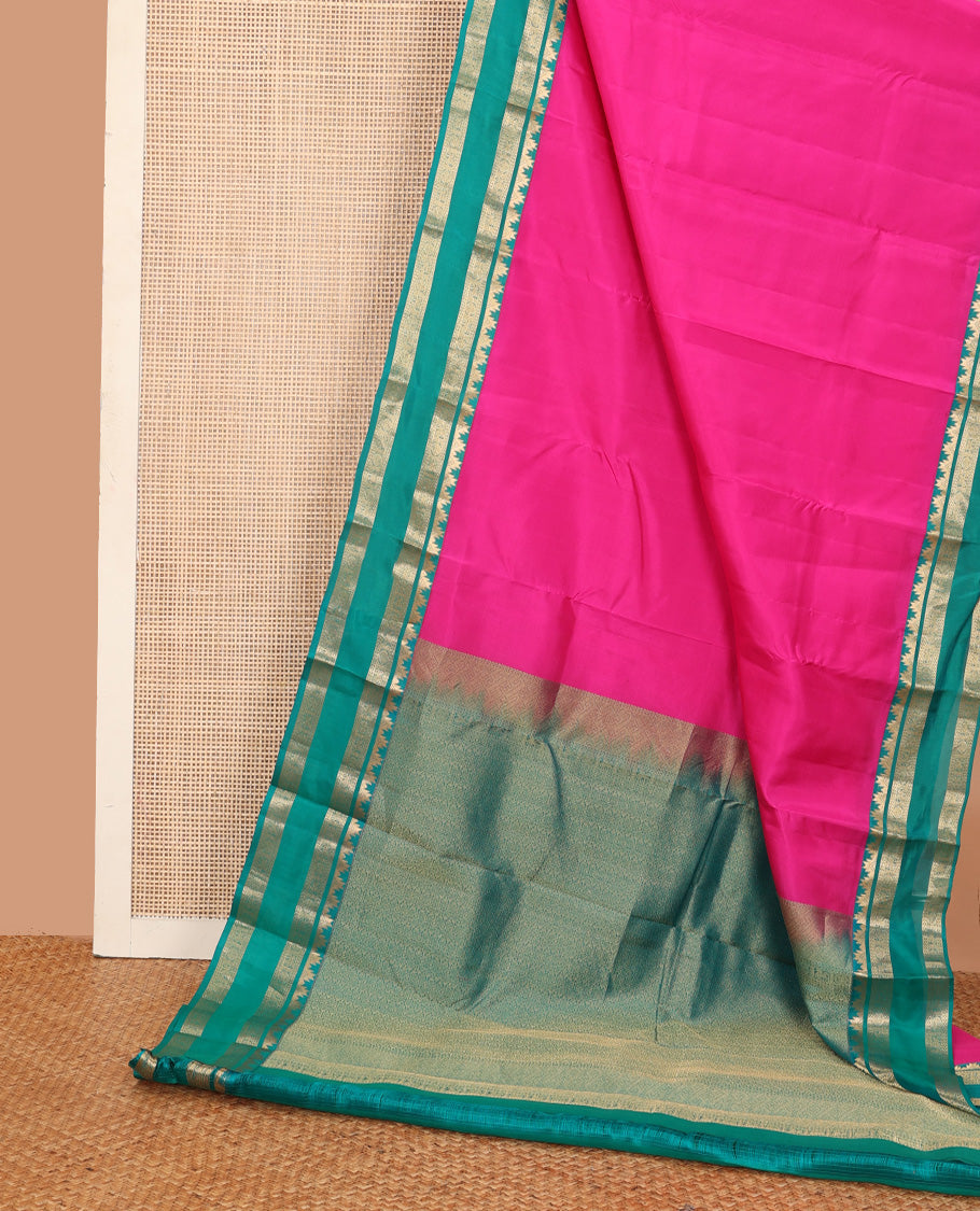 Pink plain Kanchipuram silk saree, contrast rettai pettu border of thazampoo rekku, neli, chakram, and kuthirai, and jaal pallu