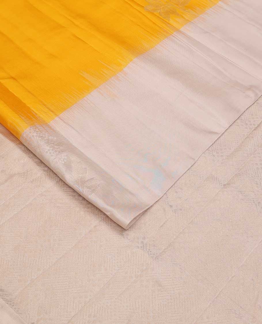 Yellow floral buttas soft silk saree, contrast border of floral buttas, and intricate pallu