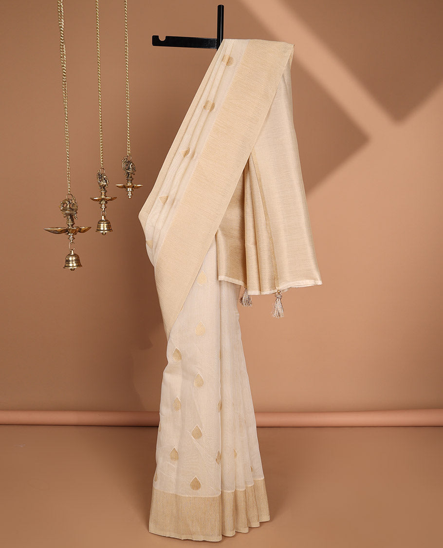 White gold butta zari handloom linentissue saree with gold rich pallu , tussels & gold tissue blouse