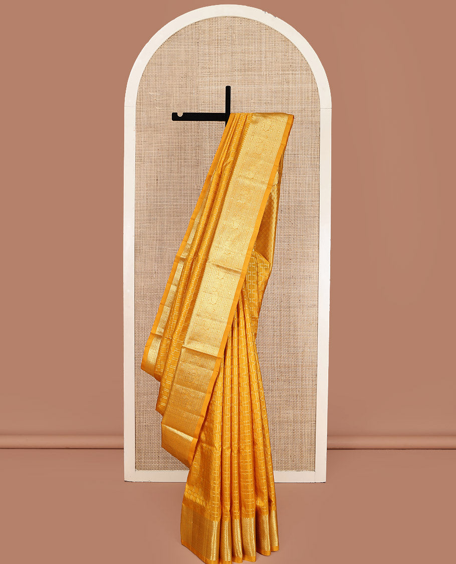 Yellow Venkatagiri Silk Saree, Gleamed Up with Geometric Design All Over Its Body, Highlightad by a Traditional Zari Design Border, Grand Jaal Pallu, and Paired with a Matching Blouse