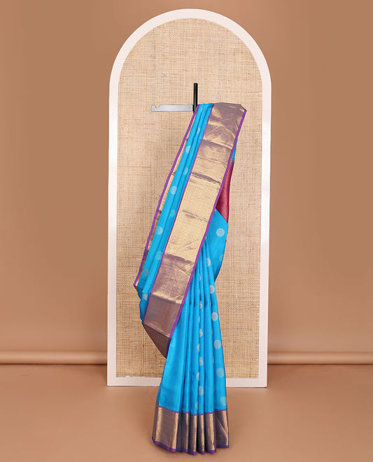Blue zari buttas Vasundhara elite silksaree, contrast border of manga mokku,muthu,kathir,banaras & poun & scallop pallu